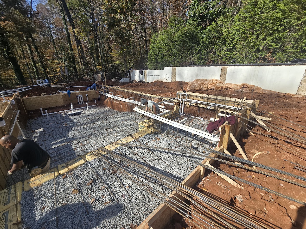 Rebar and plumbing installation for shotcrete pool