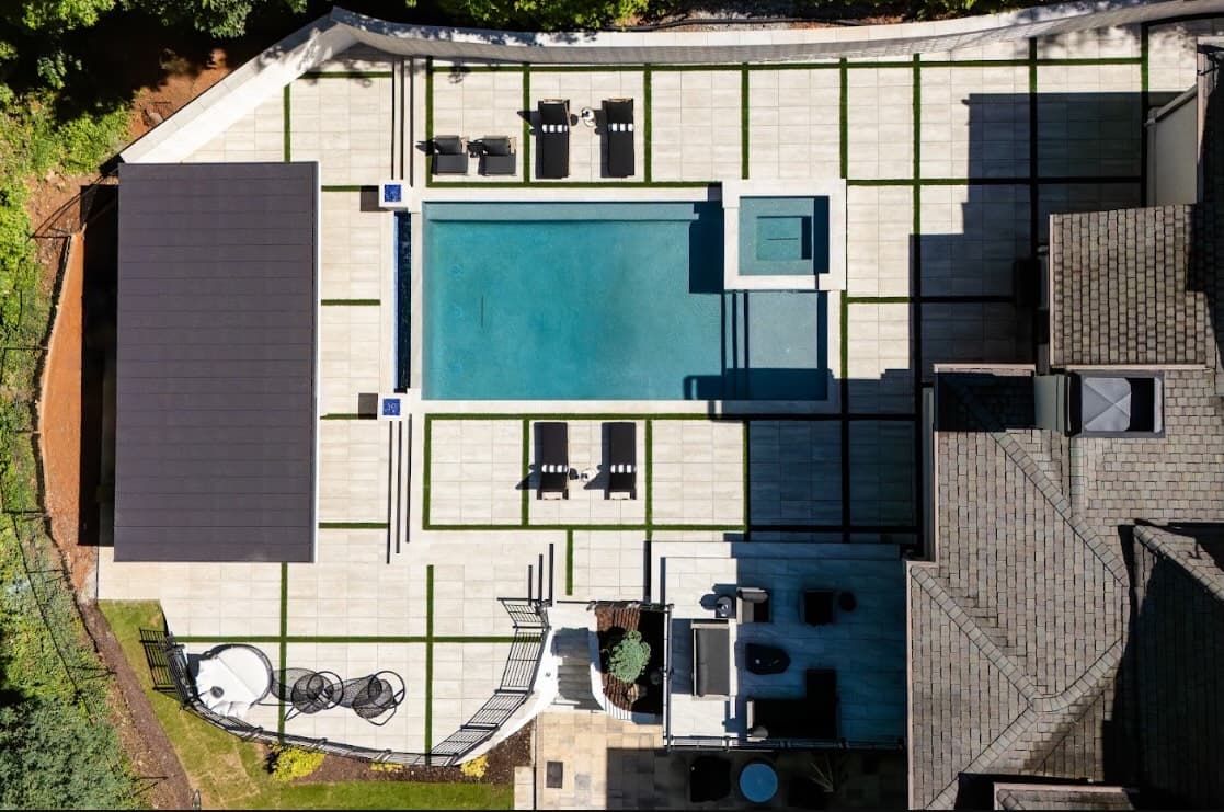 Overhead view of the geometric Buckhead pool and its grid-pattern stone deck