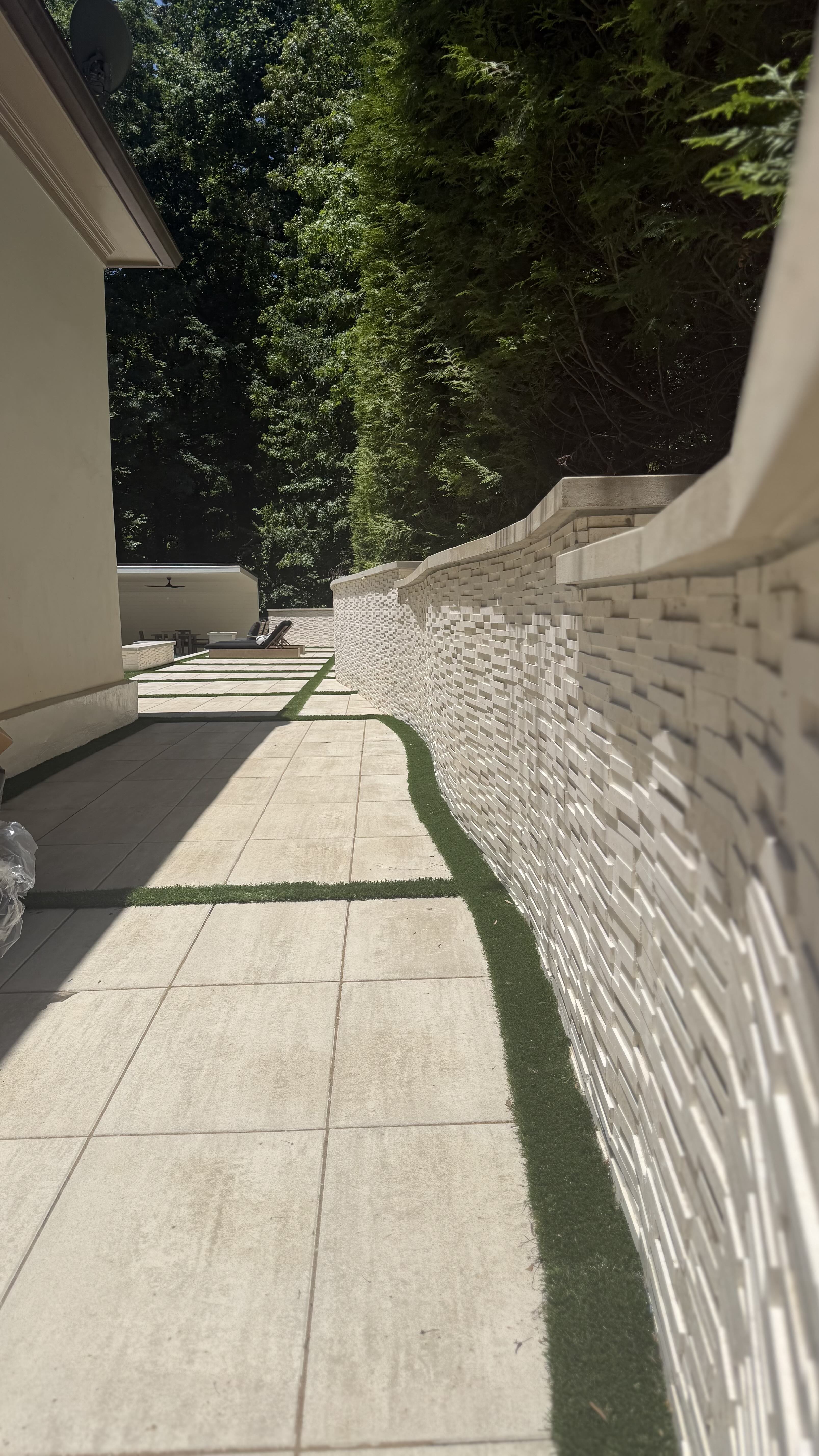 Building a Pool on a Sloped Yard in North Georgia: Drainage, Retaining Walls & Access